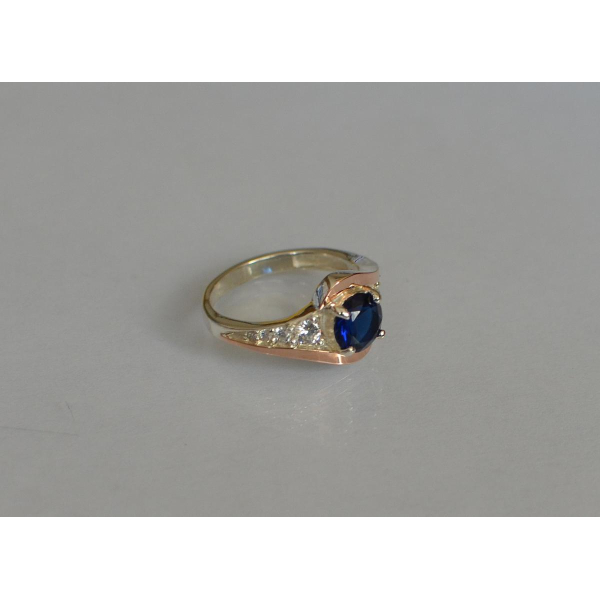 Серебряное кольцо с золотыми вставками (145к)