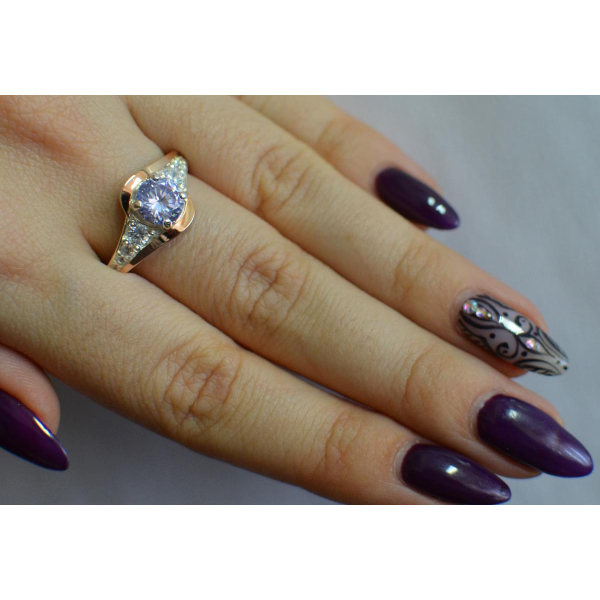 Серебряное кольцо с золотыми вставками (145к)