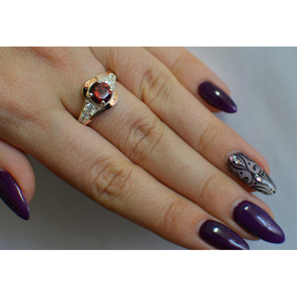 Серебряное кольцо с золотыми вставками (145к)