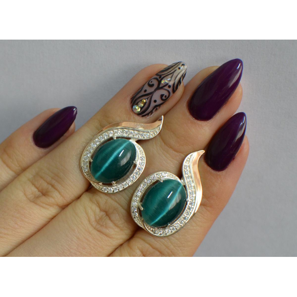 Серебряное кольцо с золотыми вставками (148с)