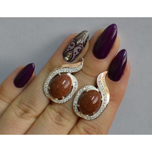 Серебряное кольцо с золотыми вставками (148с)