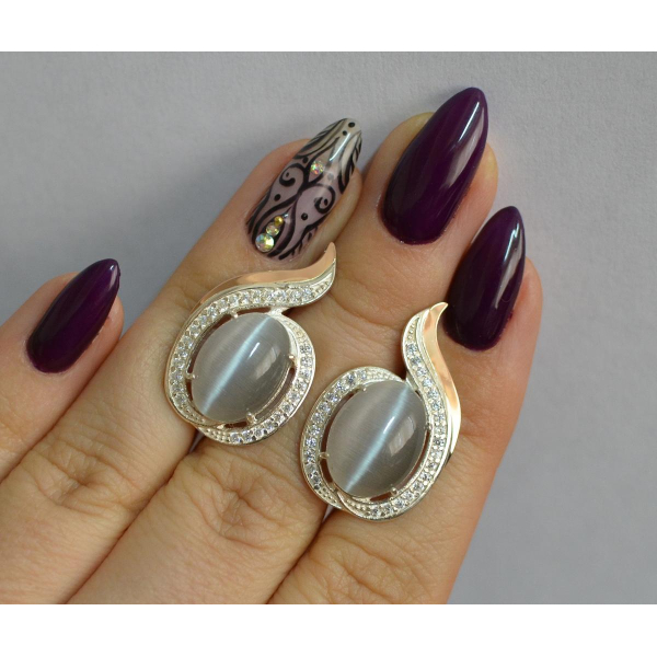 Серебряное кольцо с золотыми вставками (148с)