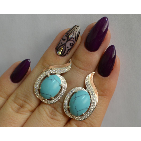 Серебряное кольцо с золотыми вставками (148с)