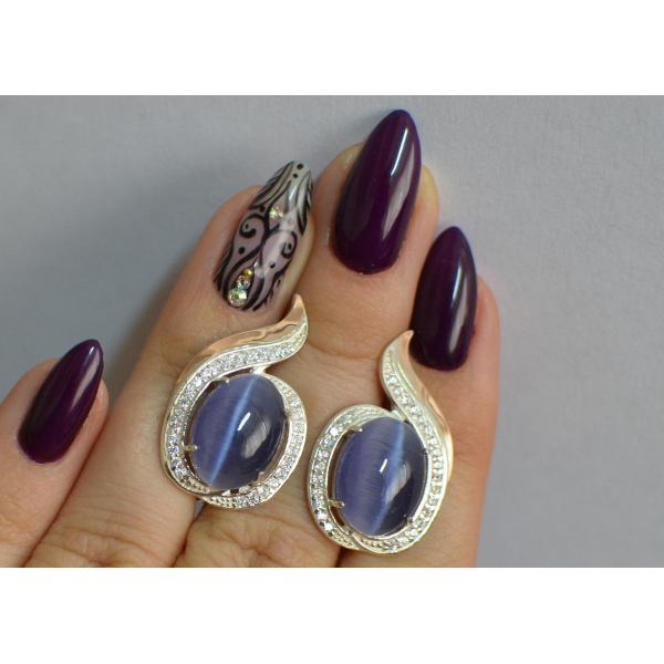 Серебряное кольцо с золотыми вставками (148с)