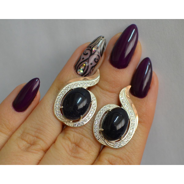 Серебряное кольцо с золотыми вставками (148с)