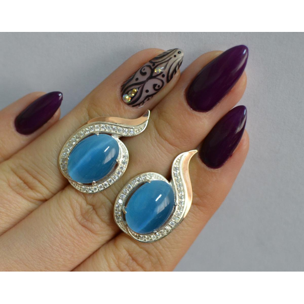 Серебряное кольцо с золотыми вставками (148с)