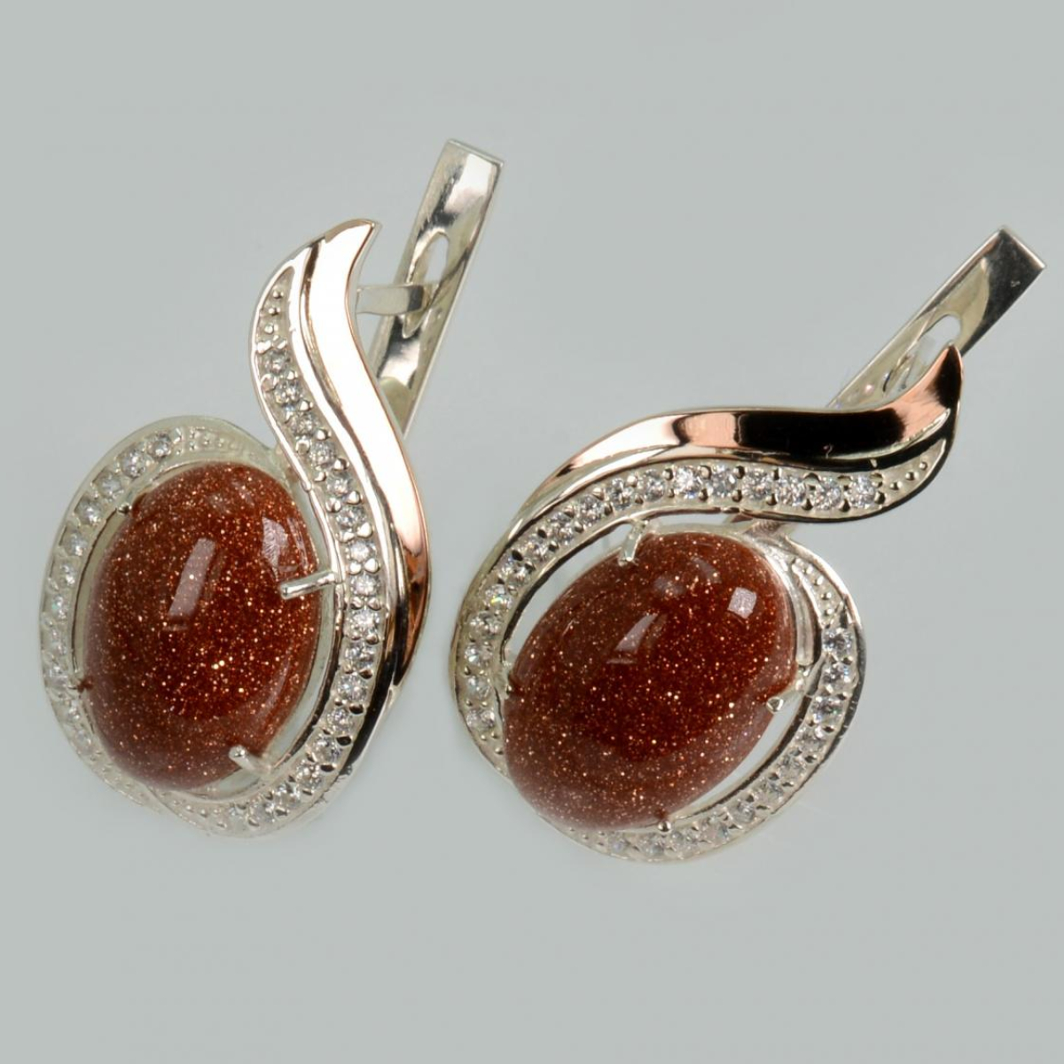 Серебряное кольцо с золотыми вставками (148с)