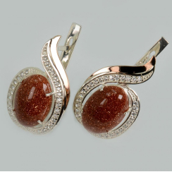 Серебряное кольцо с золотыми вставками