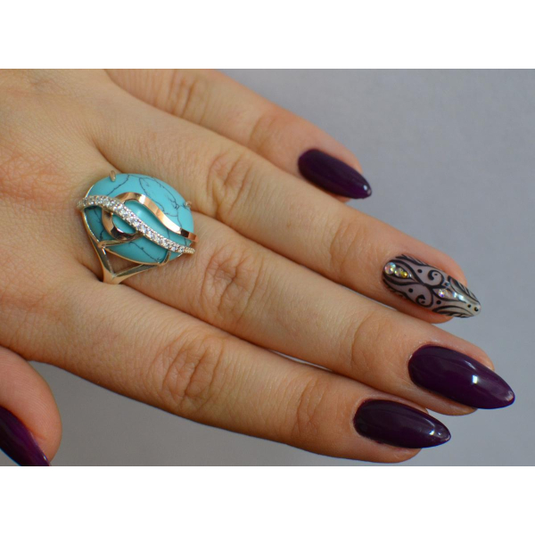 Кольцо из серебра с золотыми вставками (150к)