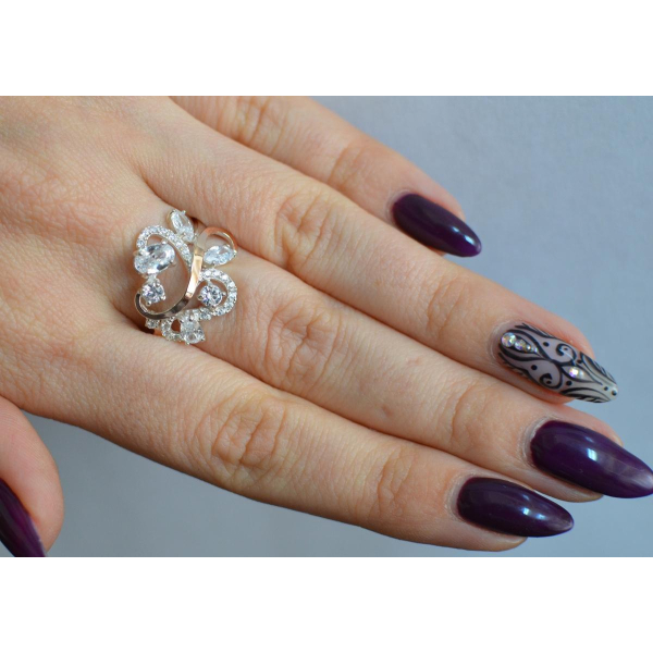 Серебряное кольцо с золотыми вставками (151к)
