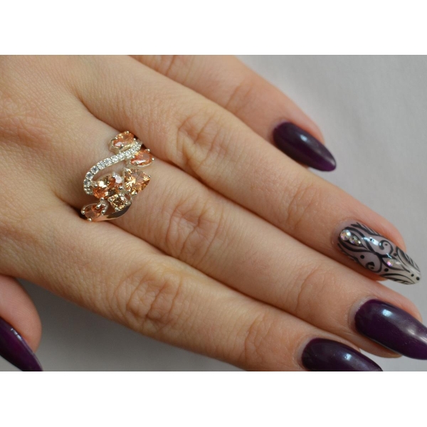 Серебряное кольцо с золотыми вставками (152к)