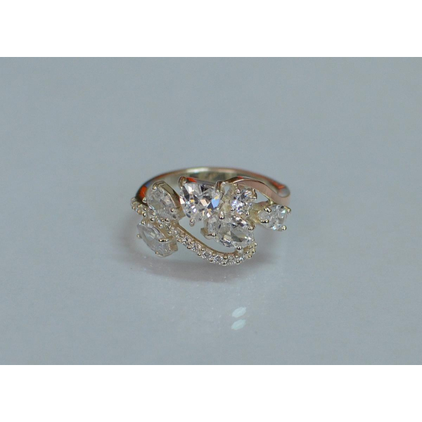 Серебряное кольцо с золотыми вставками (152к)