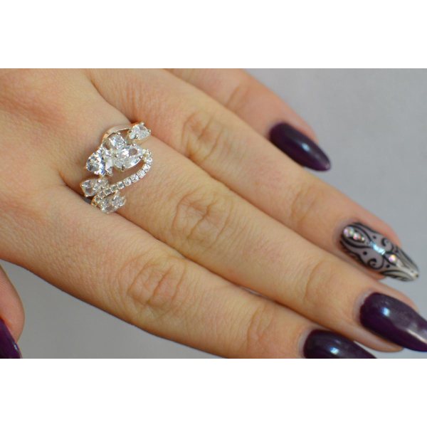 Серебряное кольцо с золотыми вставками (152к)