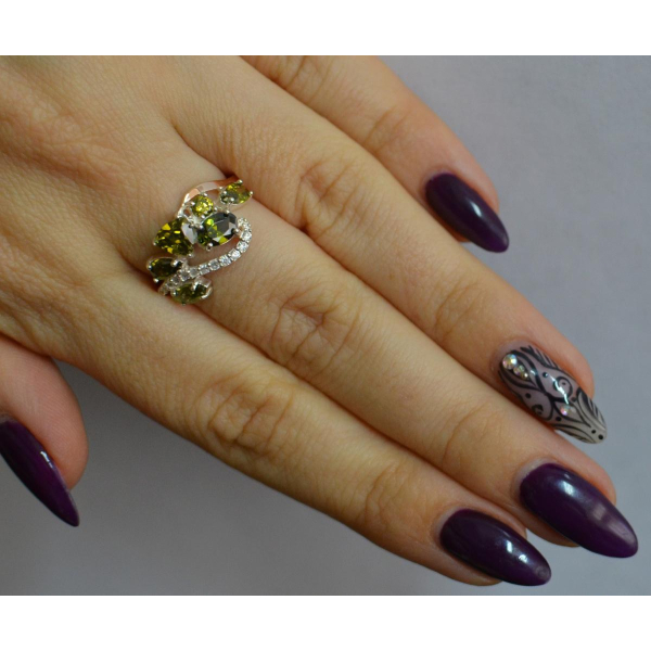 Серебряное кольцо с золотыми вставками (152к)