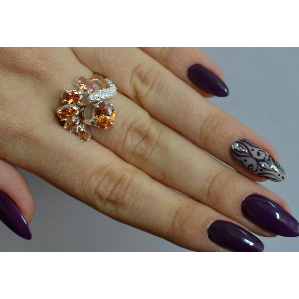 Серебряное кольцо с золотыми вставками (153к)