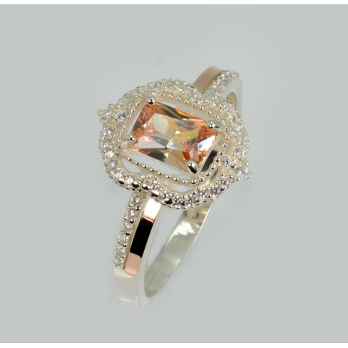 Срібна каблучка з золотими вставками