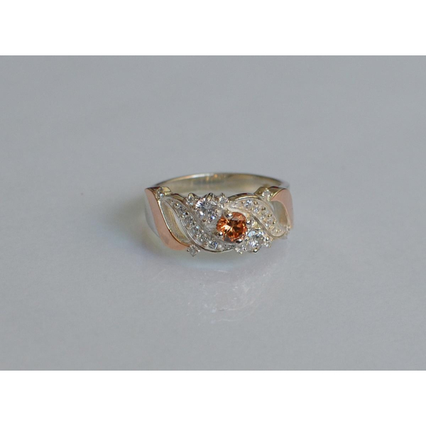 Серебряное кольцо с золотыми вставками (159к)