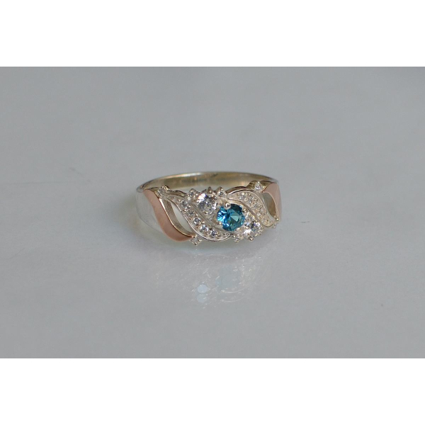 Серебряное кольцо с золотыми вставками (159к)