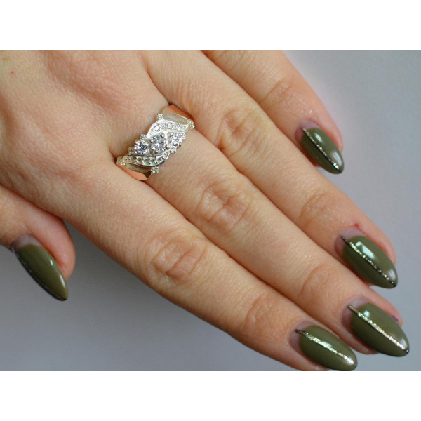 Серебряное кольцо с золотыми вставками (159к)