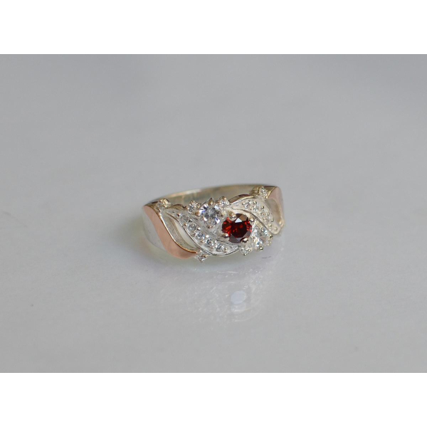 Серебряное кольцо с золотыми вставками (159к)