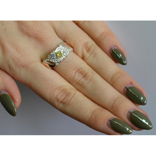 Серебряное кольцо с золотыми вставками (159к)