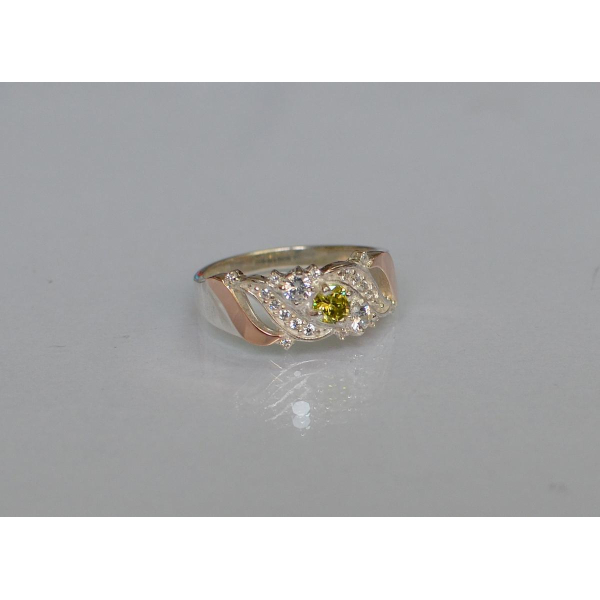 Серебряное кольцо с золотыми вставками (159к)
