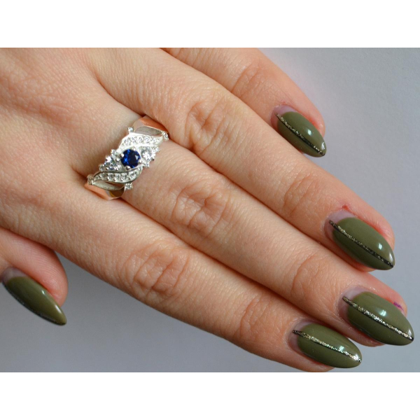 Серебряное кольцо с золотыми вставками (159к)