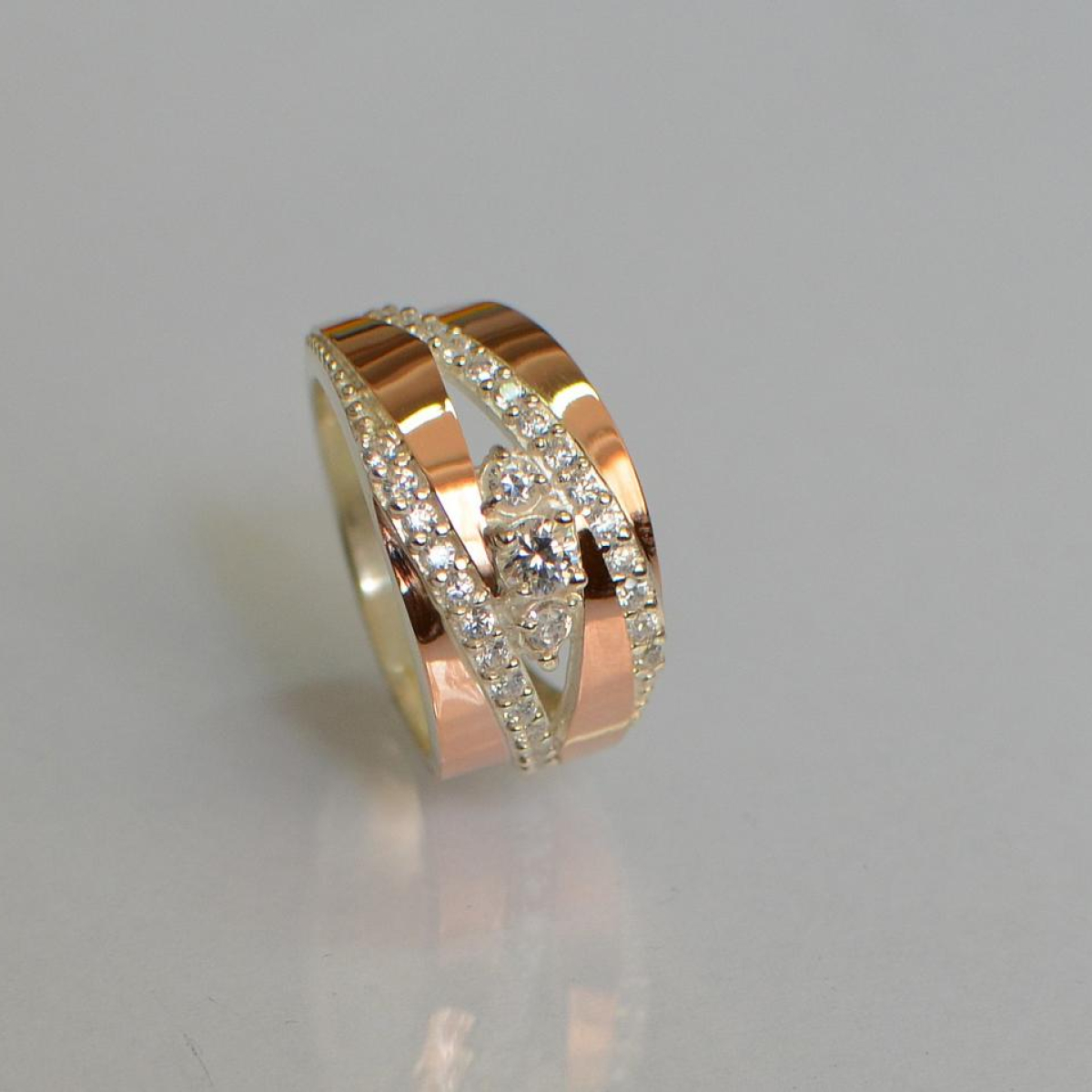 Серебряное кольцо с золотыми вставками (161к)