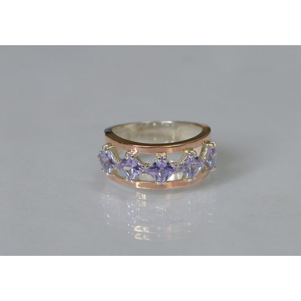 Серебряное кольцо с золотыми вставками (162к)