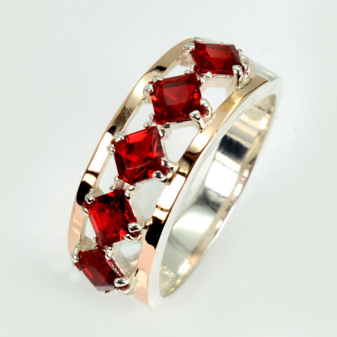 Серебряное кольцо с золотыми вставками