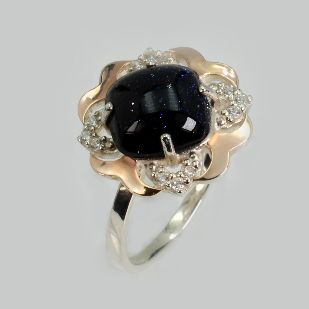 Серебряное кольцо с золотыми вставками (165к)