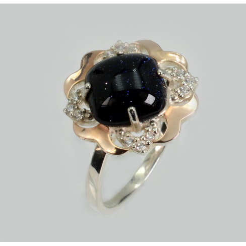 Срібна каблучка з золотими вставками