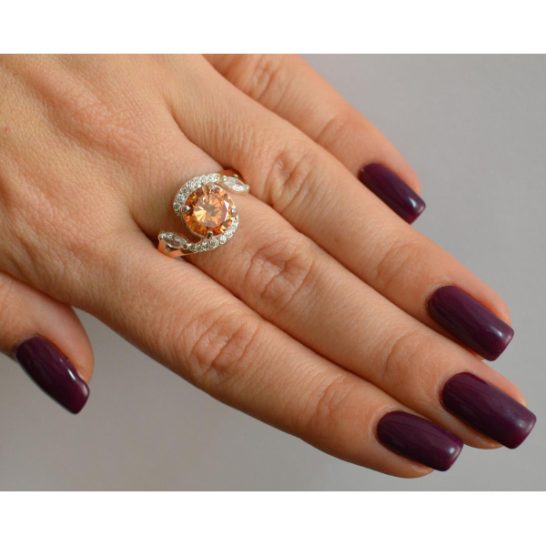 Серебряное кольцо с золотыми вставками (166к)