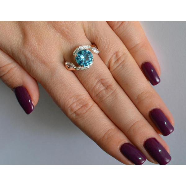 Серебряное кольцо с золотыми вставками (166к)