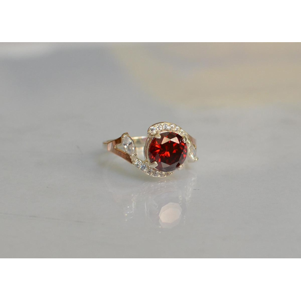 Серебряное кольцо с золотыми вставками (166к)