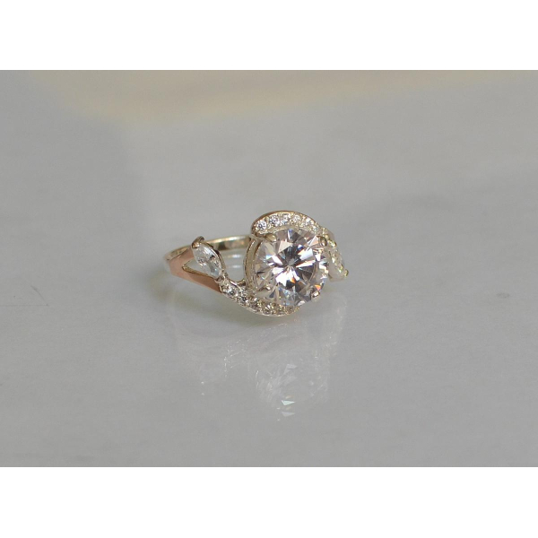 Серебряное кольцо с золотыми вставками (166к)