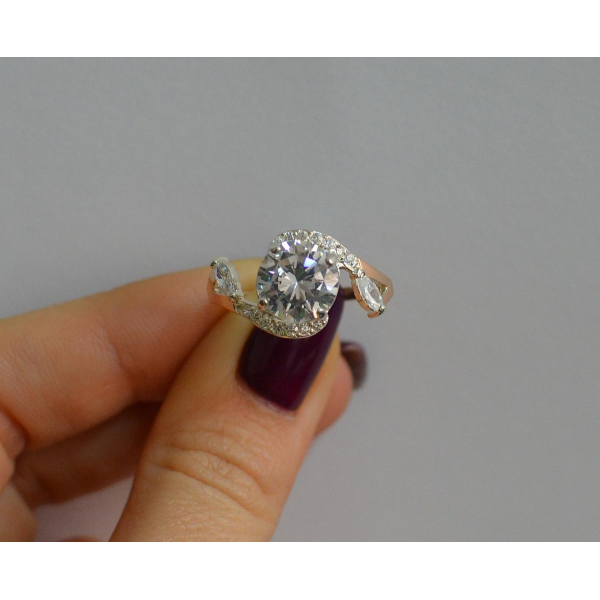 Серебряное кольцо с золотыми вставками (166к)