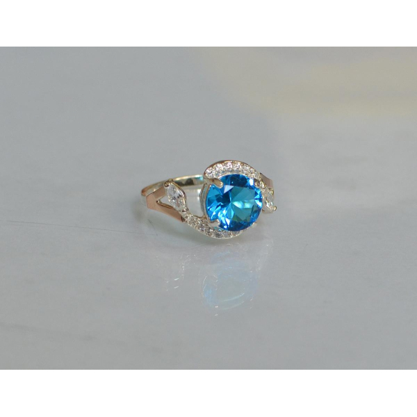 Серебряное кольцо с золотыми вставками (166к)