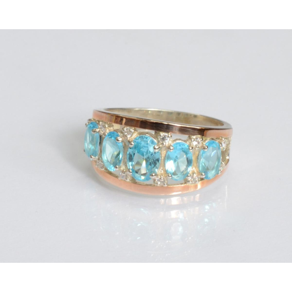 Серебряное кольцо с золотыми вставками (167к)