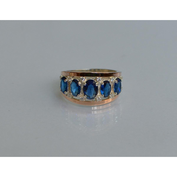 Серебряное кольцо с золотыми вставками (167к)