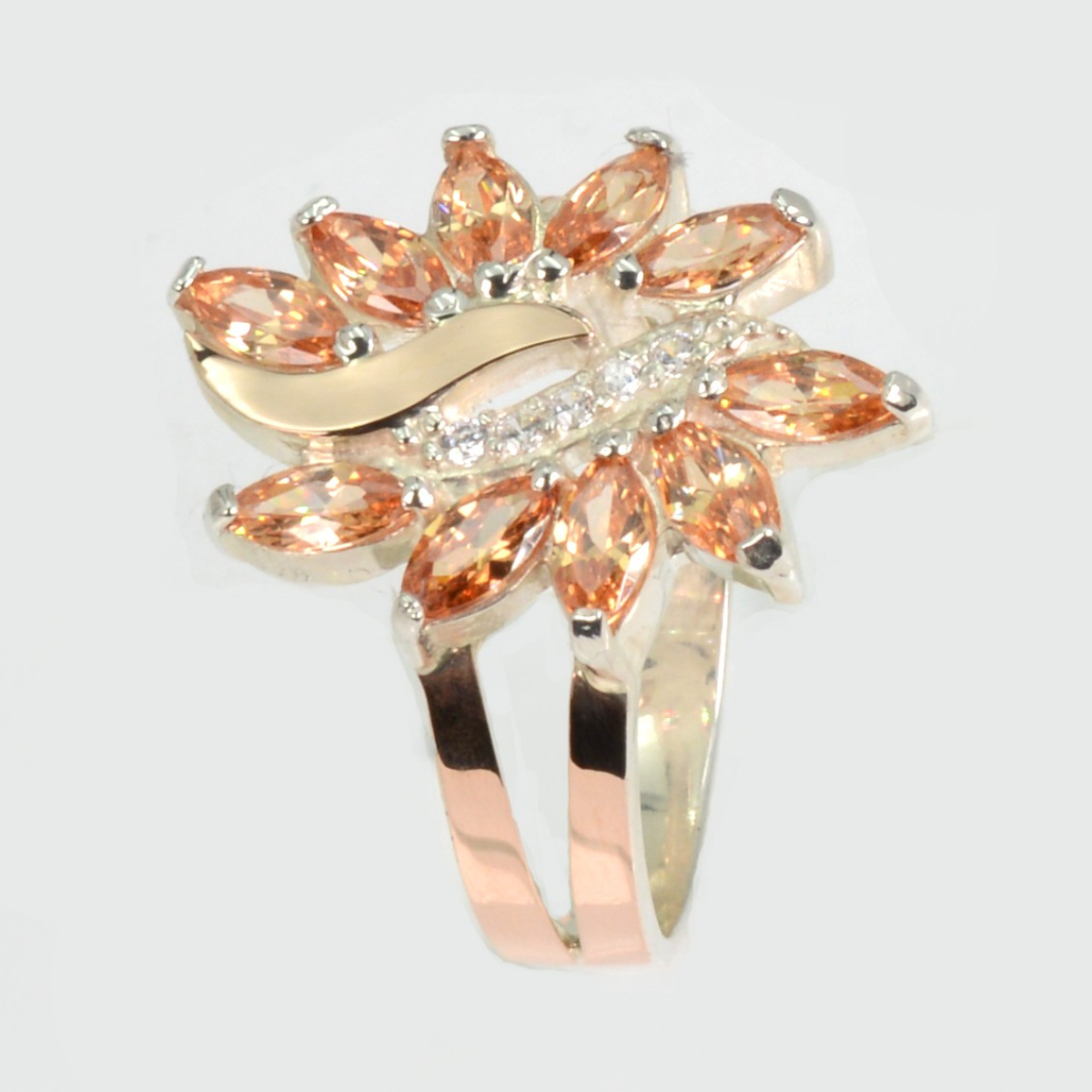 Серебряное кольцо с золотыми вставками (170к)