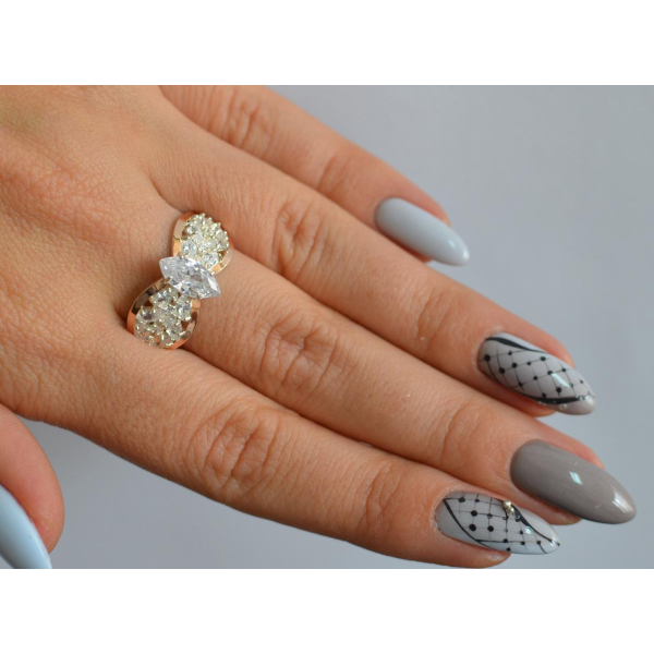 Серебряное кольцо с золотыми вставками (172к)