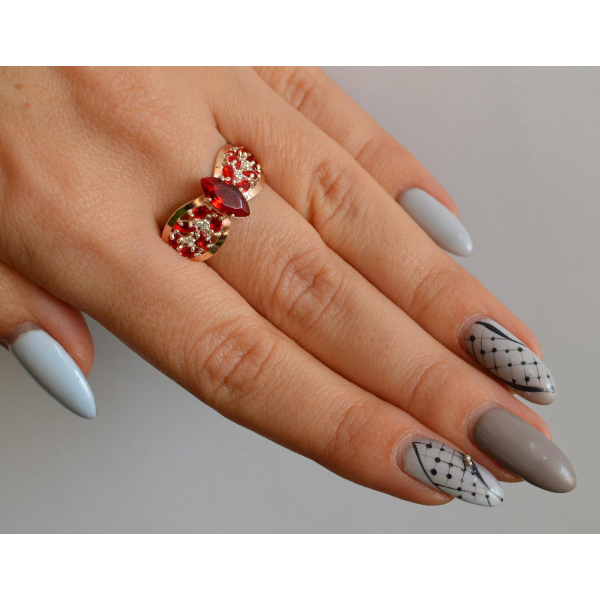 Серебряное кольцо с золотыми вставками (172к)