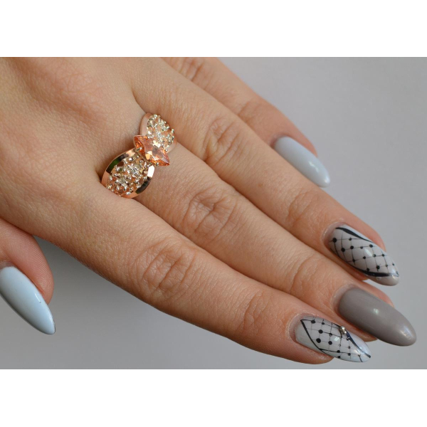 Серебряное кольцо с золотыми вставками (172к)