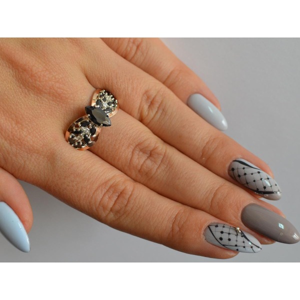 Серебряное кольцо с золотыми вставками (172к)