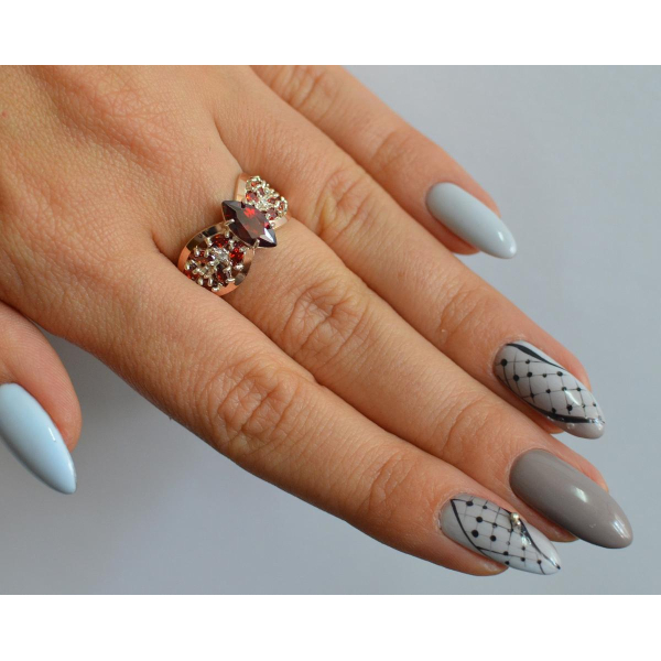 Серебряное кольцо с золотыми вставками (172к)