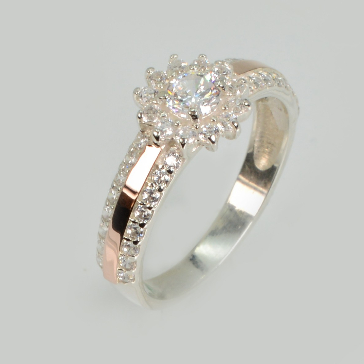 Серебряное кольцо с золотыми вставками (175к)