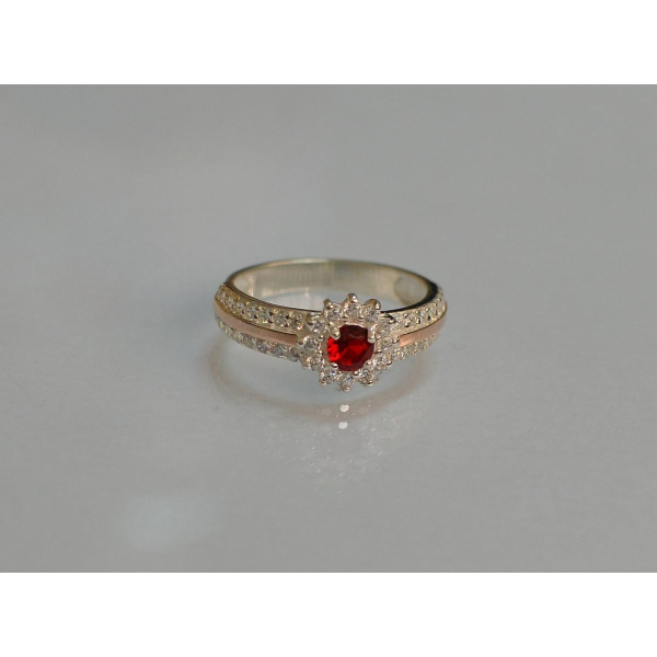 Серебряное кольцо с золотыми вставками (175к)