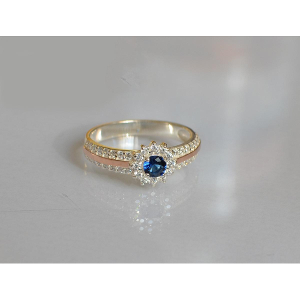 Серебряное кольцо с золотыми вставками (175к)