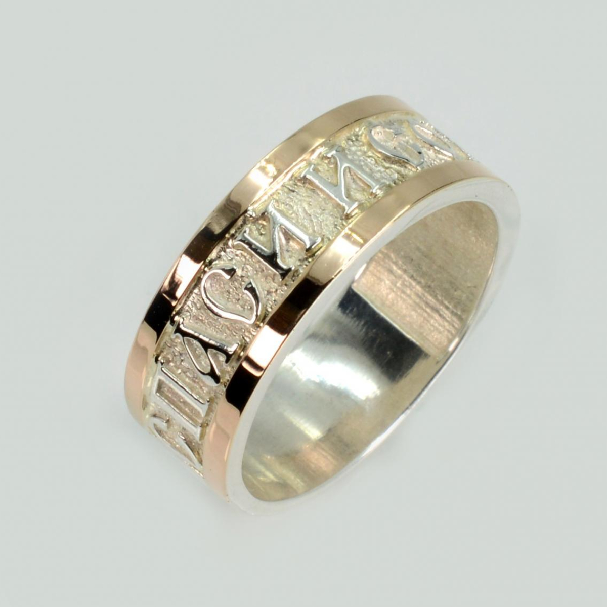 Серебряное кольцо с золотыми вставками (176к)